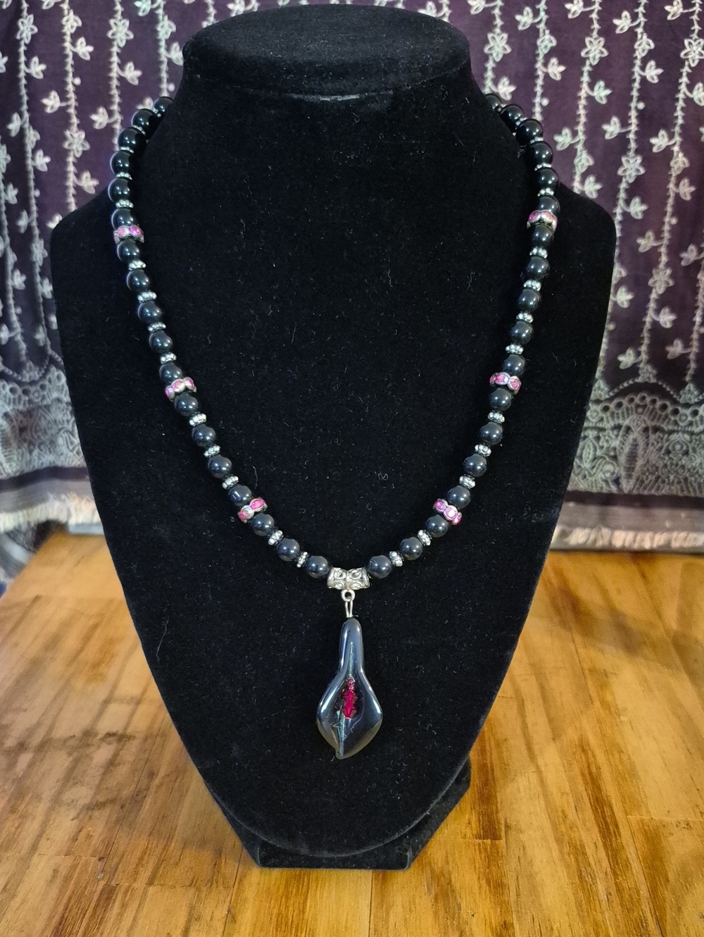 Handcrafted Black Bead Necklace with Pink Accents and Glass Pendant